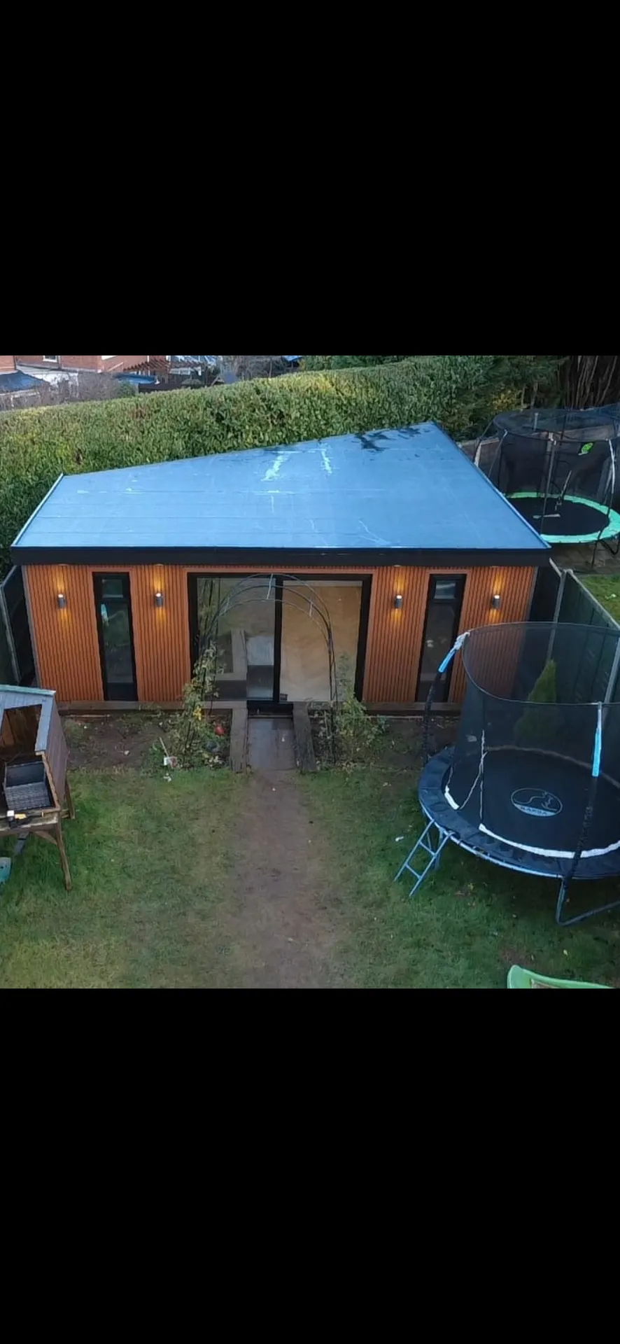 Large garden room with modern cladding