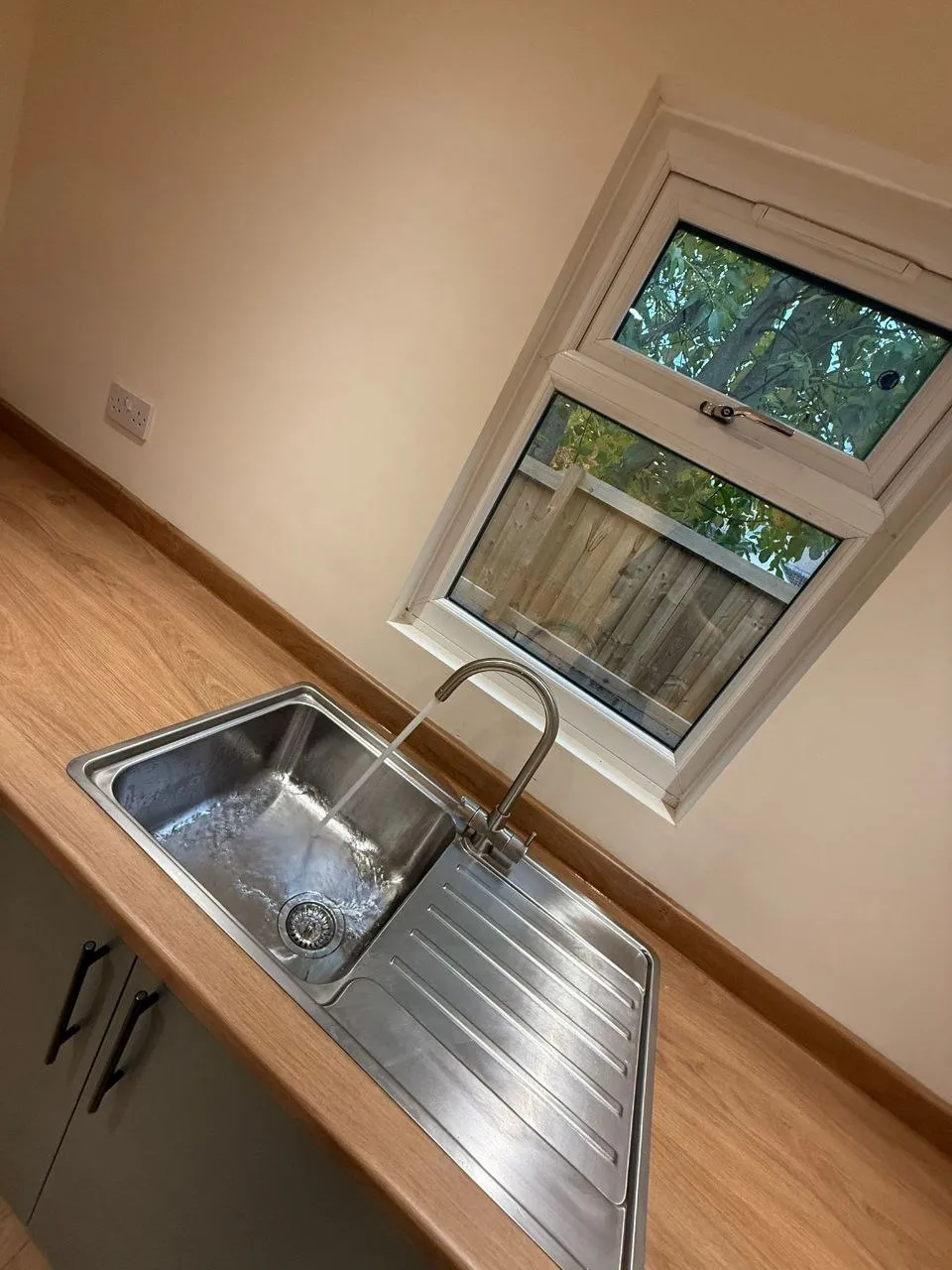 Kitchen worktop with stainless steel sink